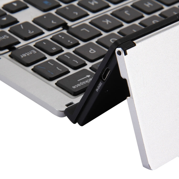 F18 Ultra-slim Rechargeable Foldable 58 Keys Bluetooth Wireless Keyboard with Holder (Silver) - Wireless Keyboard by PMC Jewellery | Online Shopping South Africa | PMC Jewellery | Buy Now Pay Later Mobicred