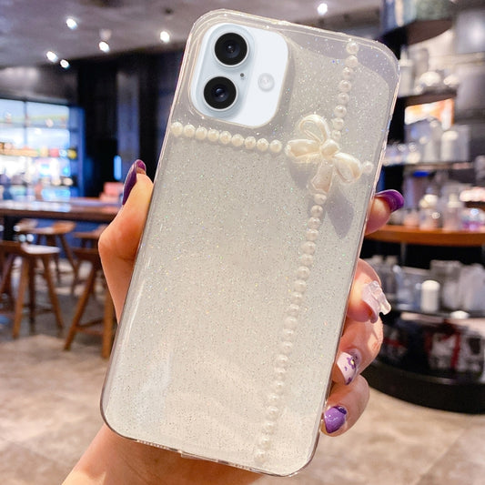 For iPhone 16 Pearl Bow Glitter Epoxy TPU Phone Case(Cross Knots) - iPhone 16 Cases by PMC Jewellery | Online Shopping South Africa | PMC Jewellery | Buy Now Pay Later Mobicred