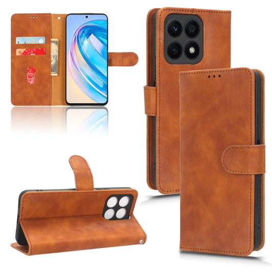 For Honor X8a Skin Feel Magnetic Flip Leather Phone Case(Brown) - Honor Cases by PMC Jewellery | Online Shopping South Africa | PMC Jewellery